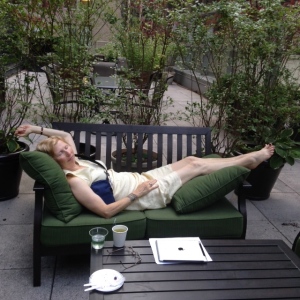 Me, reclining with chemo overnight bag pumping away, on the cancer terrace.